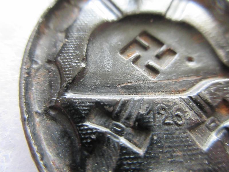 TRIPLE MAKER MARKED BLACK WOUND BADGE