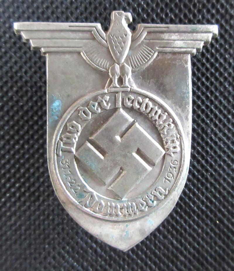 1936 TINNIE/DAY BADGE